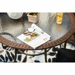 Style Selections Spruce Hills 39 1/2-in Tempered Glass Round Patio Dining Table 7 Style Selections Spruce Hills 39 1/2-in Tempered Glass Round Patio Dining Table -STYLE SELECTIONS Shop 41355019b L